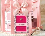 Pink "Delivered With Love" Boxes From The Personalized Expressions Collection wedding favors