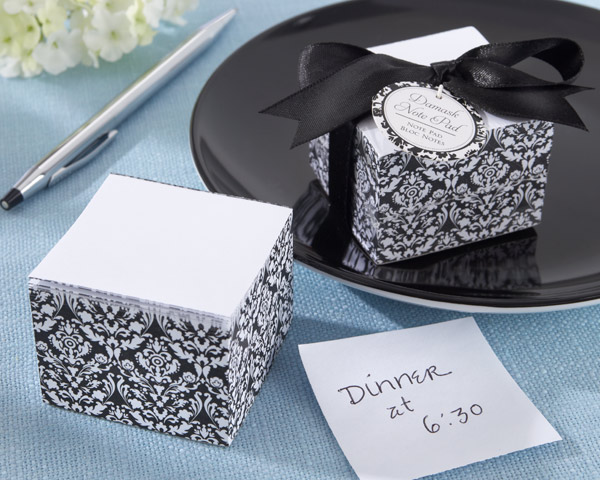 Pursesize and pretty in black and white these thoughtful wedding favors 